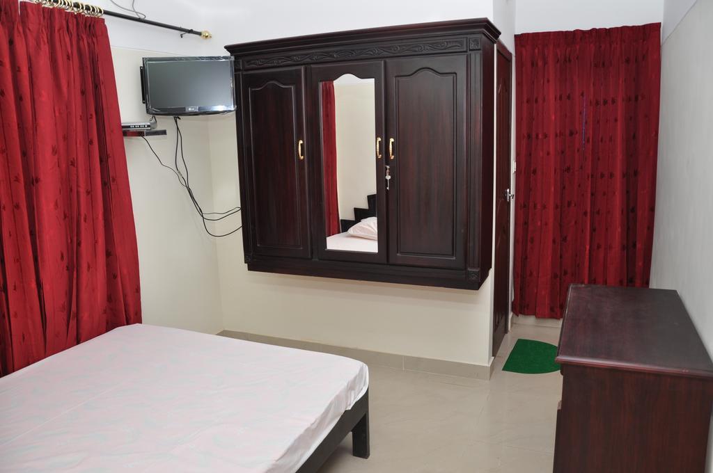 Dreamz Hotel Thiruvananthapuram Стая снимка